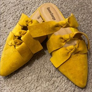 Yellow loader slip ons